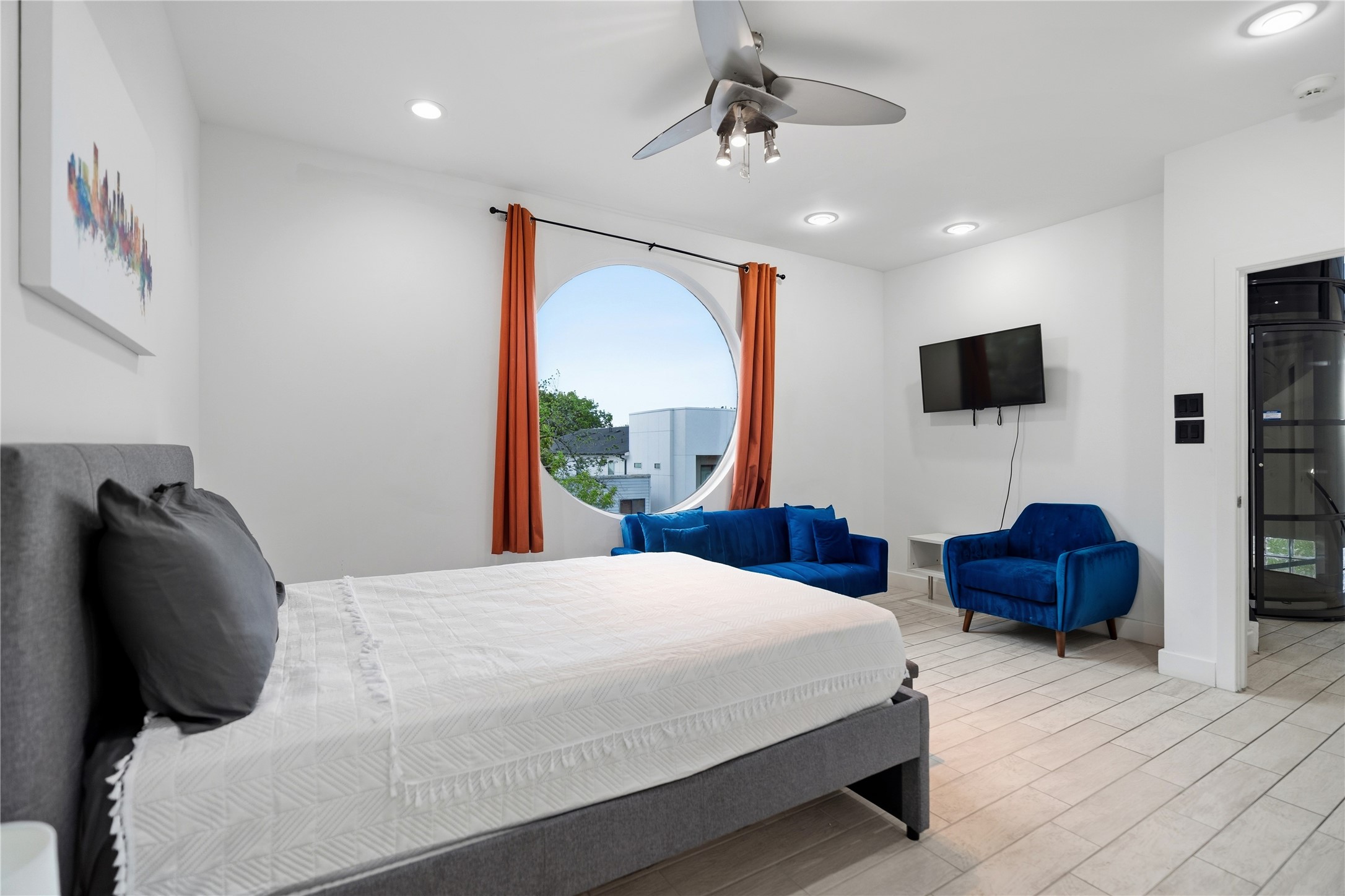 2025 Colquitt Street, Unit A Houston, TX 77098 - Photo 33 of 40 a bedroom with a bed window and couch