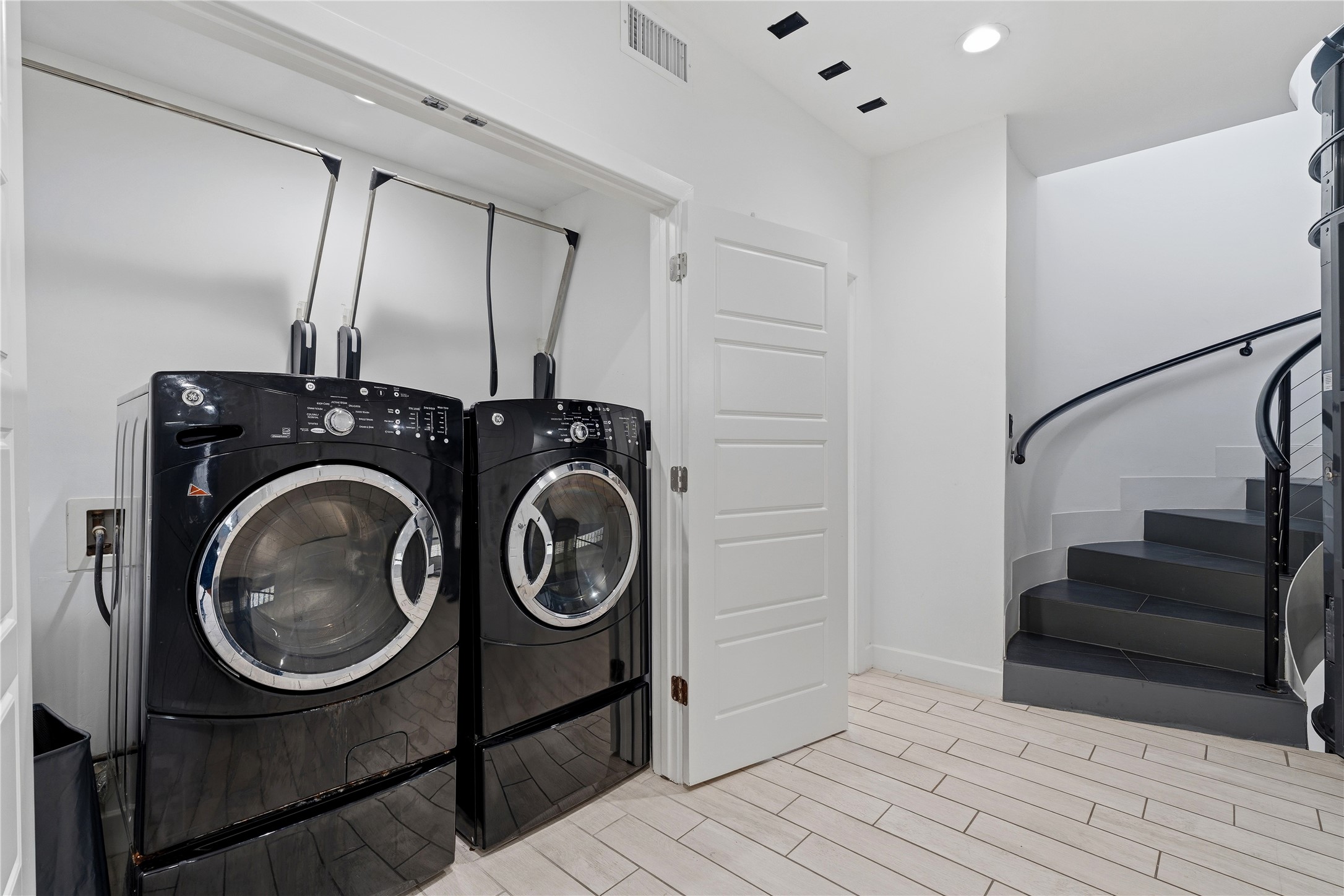 2025 Colquitt Street, Unit A Houston, TX 77098 - Photo 35 of 40 a view of entryway with washer and dryer