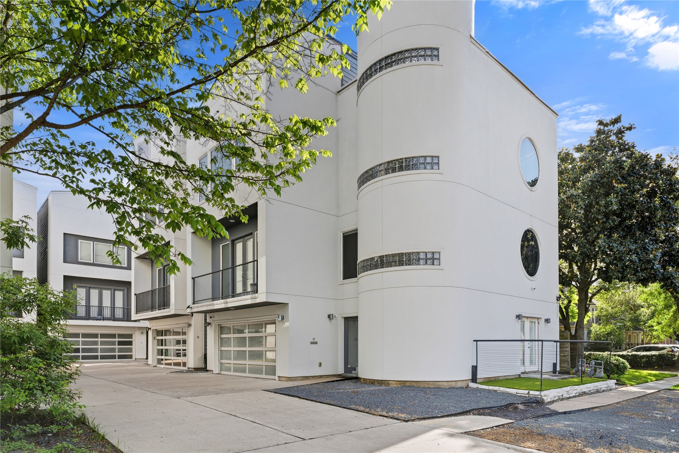 2025 Colquitt Street, Unit A Houston, TX 77098 - Photo 38 of 40 a front view of a building with a tree
