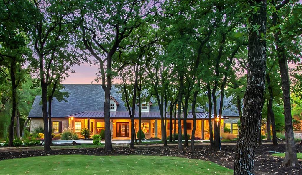 a view of swimming pool and trees in the background