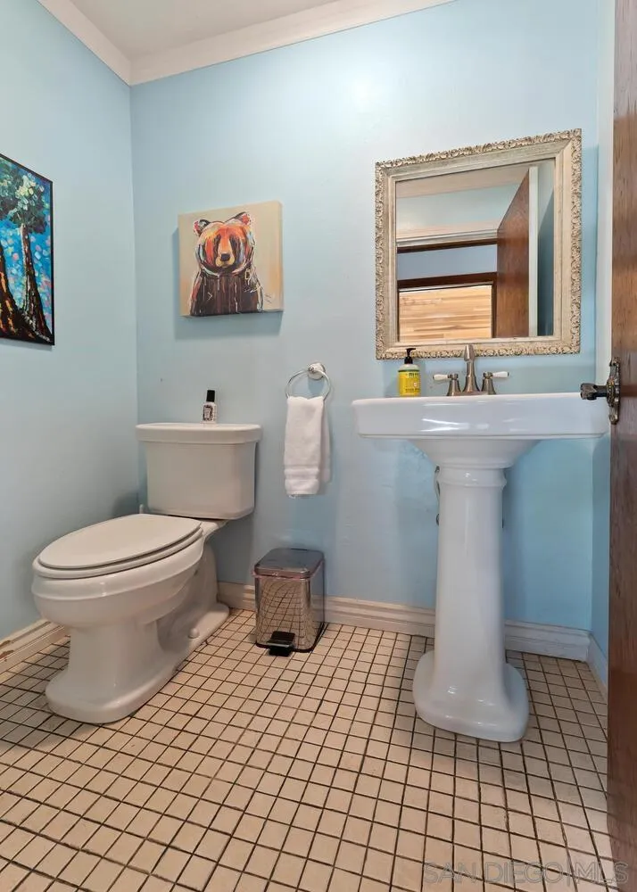 43812 South Fork Drive Three Rivers, CA 93271 - Photo 29 of 43 a bathroom with a toilet and a mirror