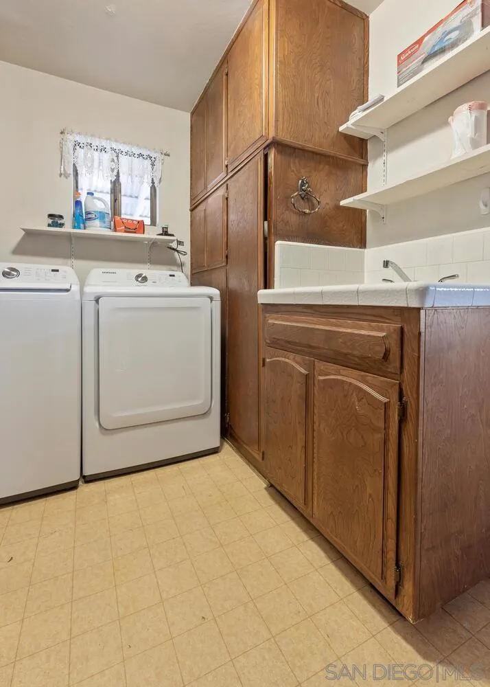 43812 South Fork Drive Three Rivers, CA 93271 - Photo 34 of 43 a utility room with dryer and washer