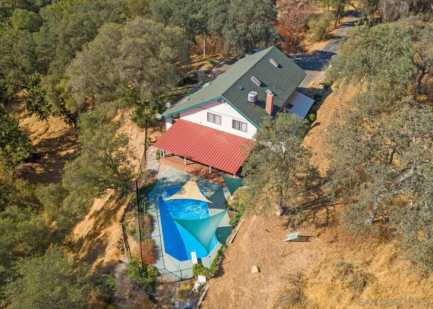 43812 South Fork Drive Three Rivers, CA 93271 - Photo 4 of 43 an aerial view of a house with a yard and trees