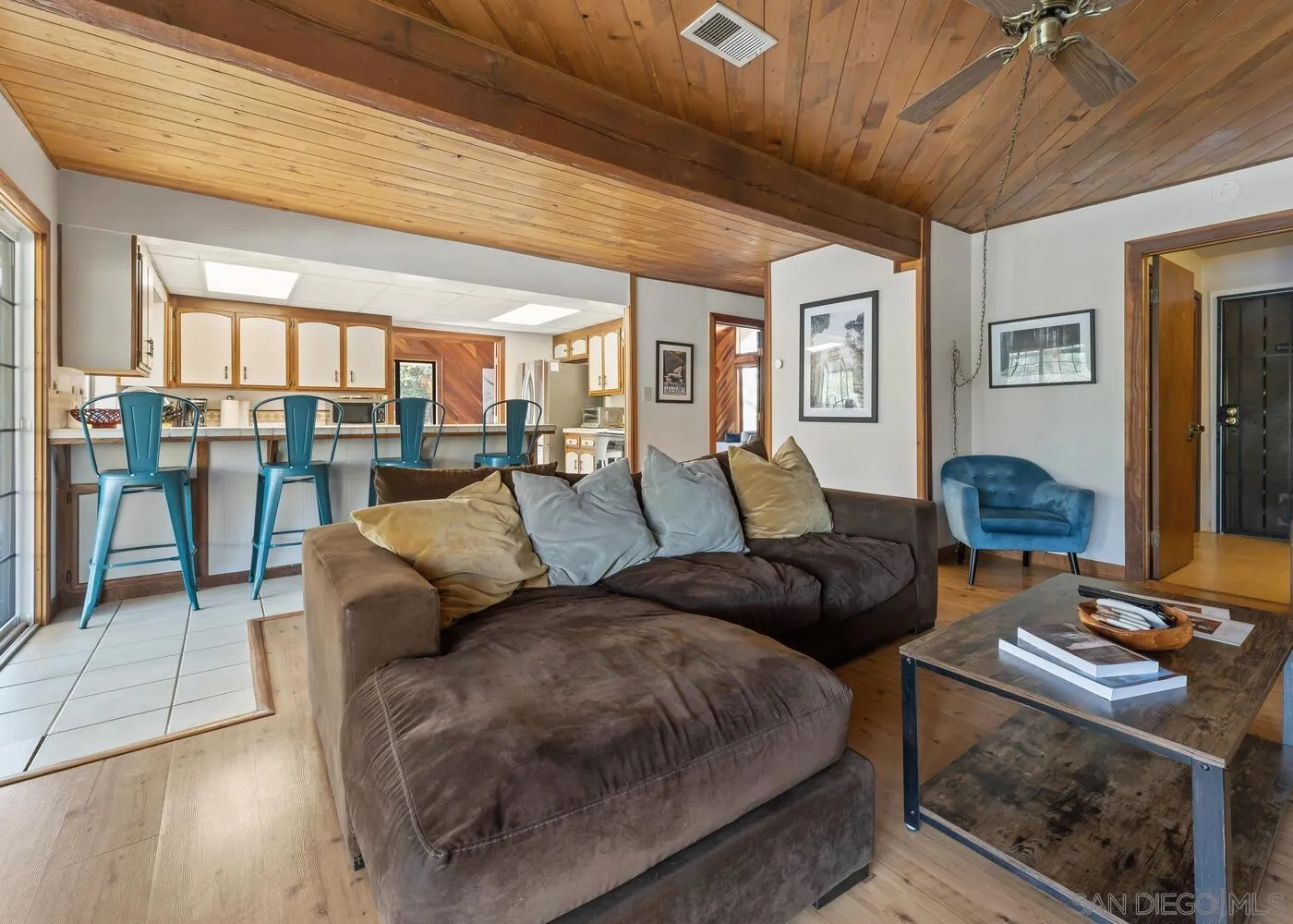 43812 South Fork Drive Three Rivers, CA 93271 - Photo 10 of 43 a living room with furniture a rug and a chandelier