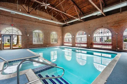 a view of a house with swimming pool