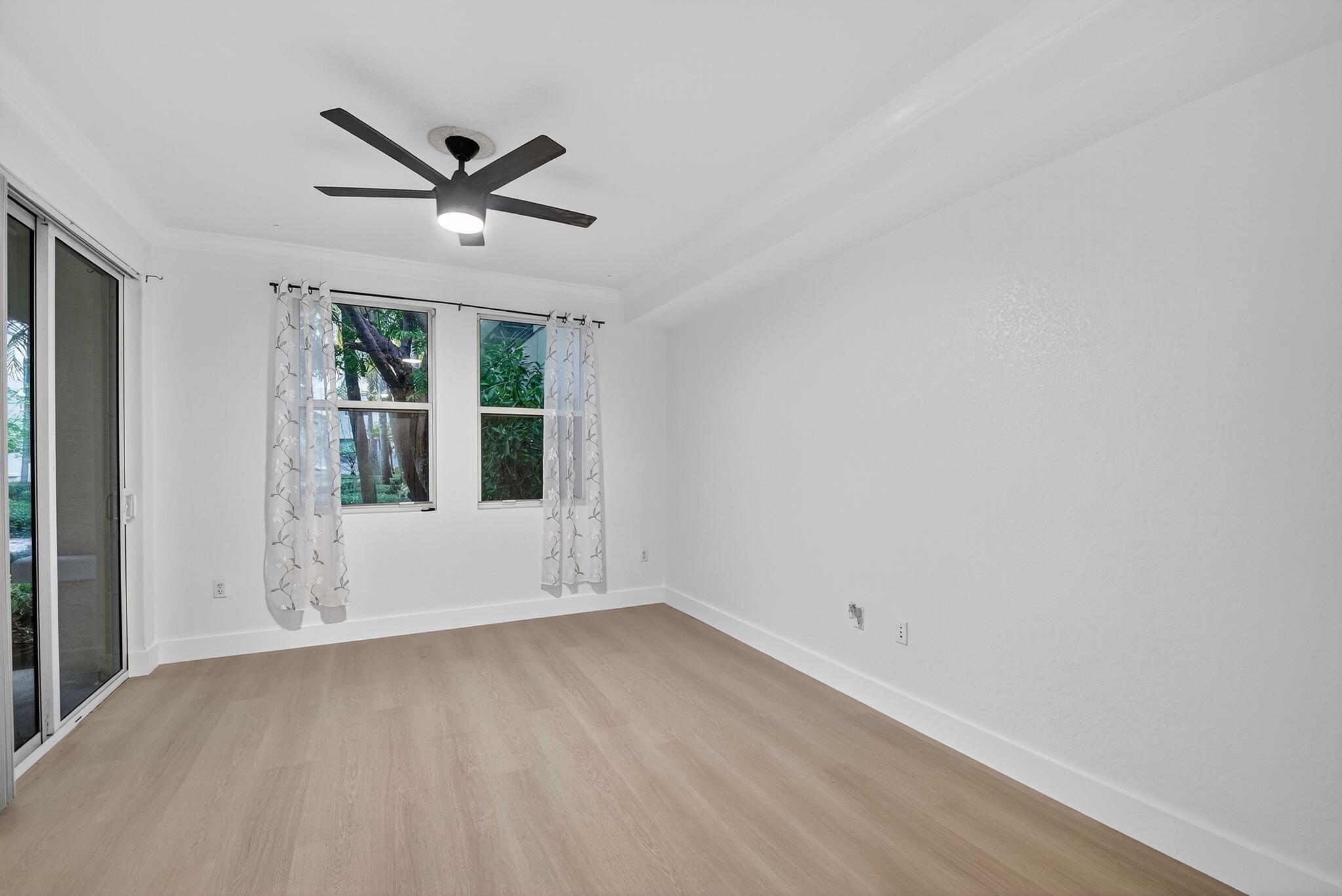 1 Renaissance Way, Unit 116 Boynton Beach, FL 33426 - Photo 15 of 34 a view of an empty room with a window
