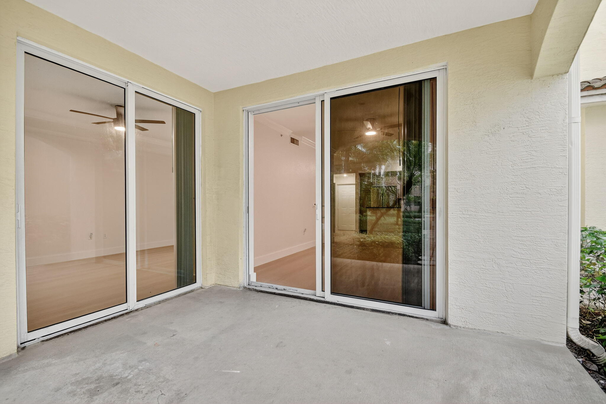 1 Renaissance Way, Unit 116 Boynton Beach, FL 33426 - Photo 19 of 34 a view of an empty room with glass door