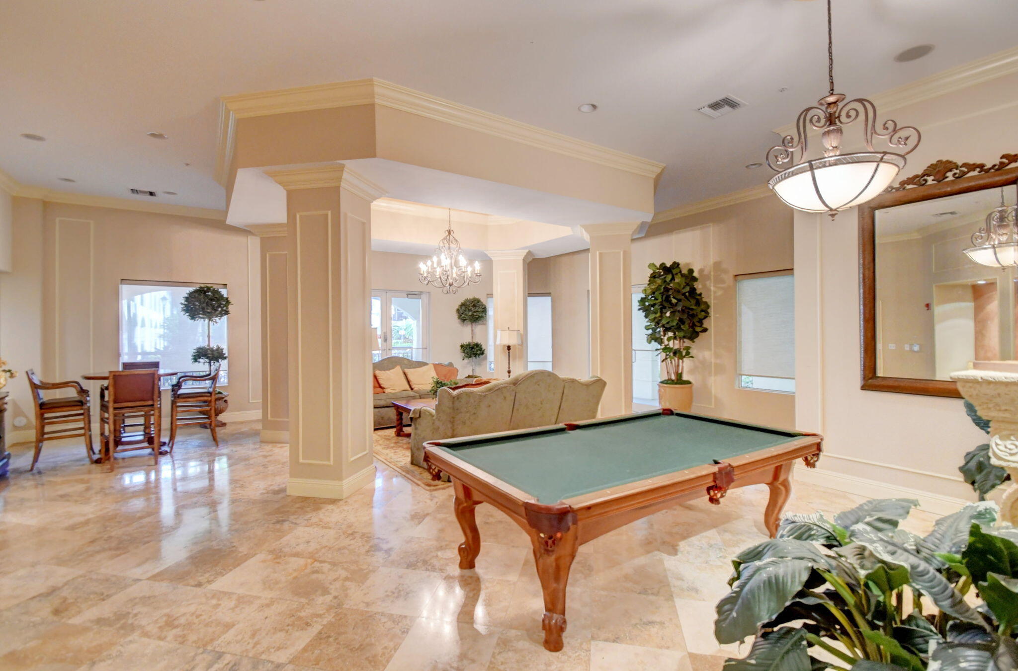1 Renaissance Way, Unit 116 Boynton Beach, FL 33426 - Photo 25 of 34 a view of a room with furniture and a chandelier