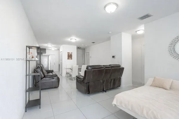 a living room with furniture and a couch