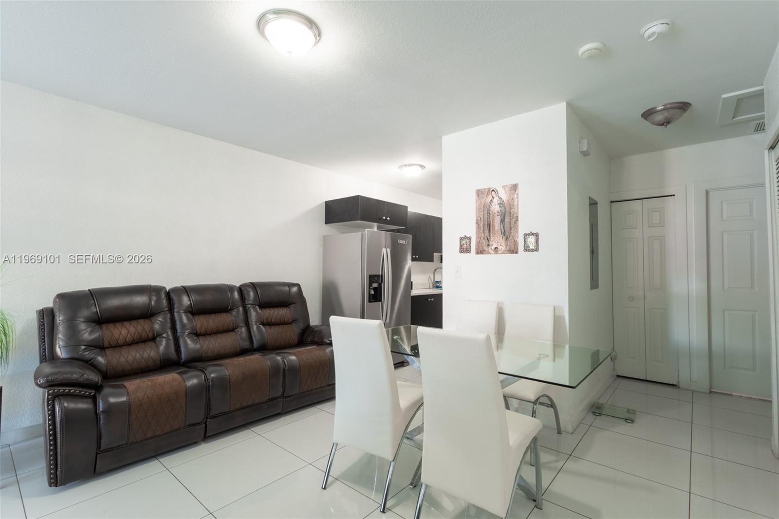 1998 Northwest 47th Street Miami, FL 33142 - Photo 8 of 17 a living room with furniture