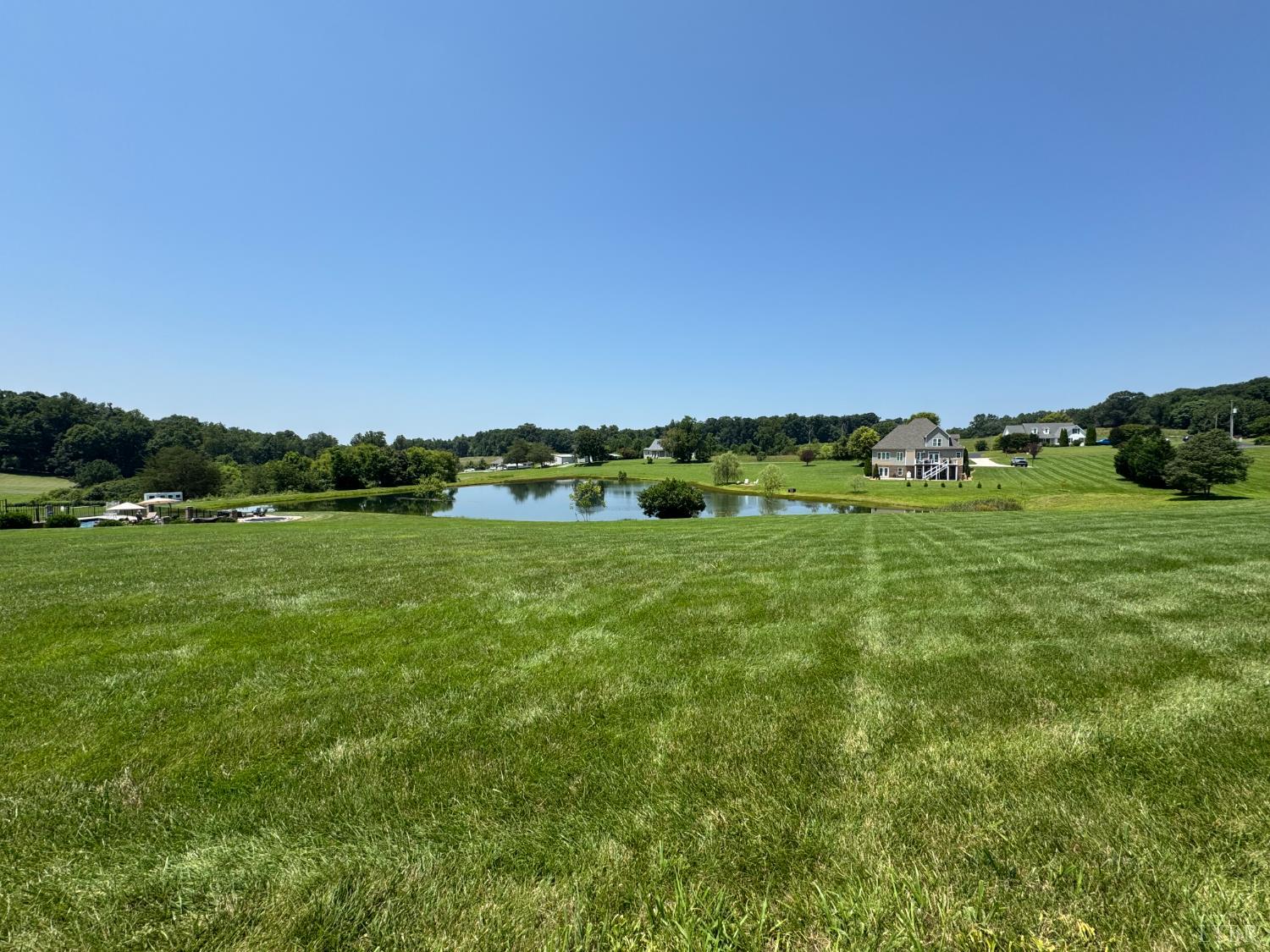 3 Duck Pond Appomattox, VA 24522 - Photo 2 of 7 a view of a grassy field with trees
