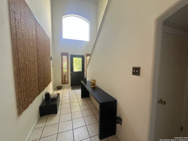 a room with a couple of white walls