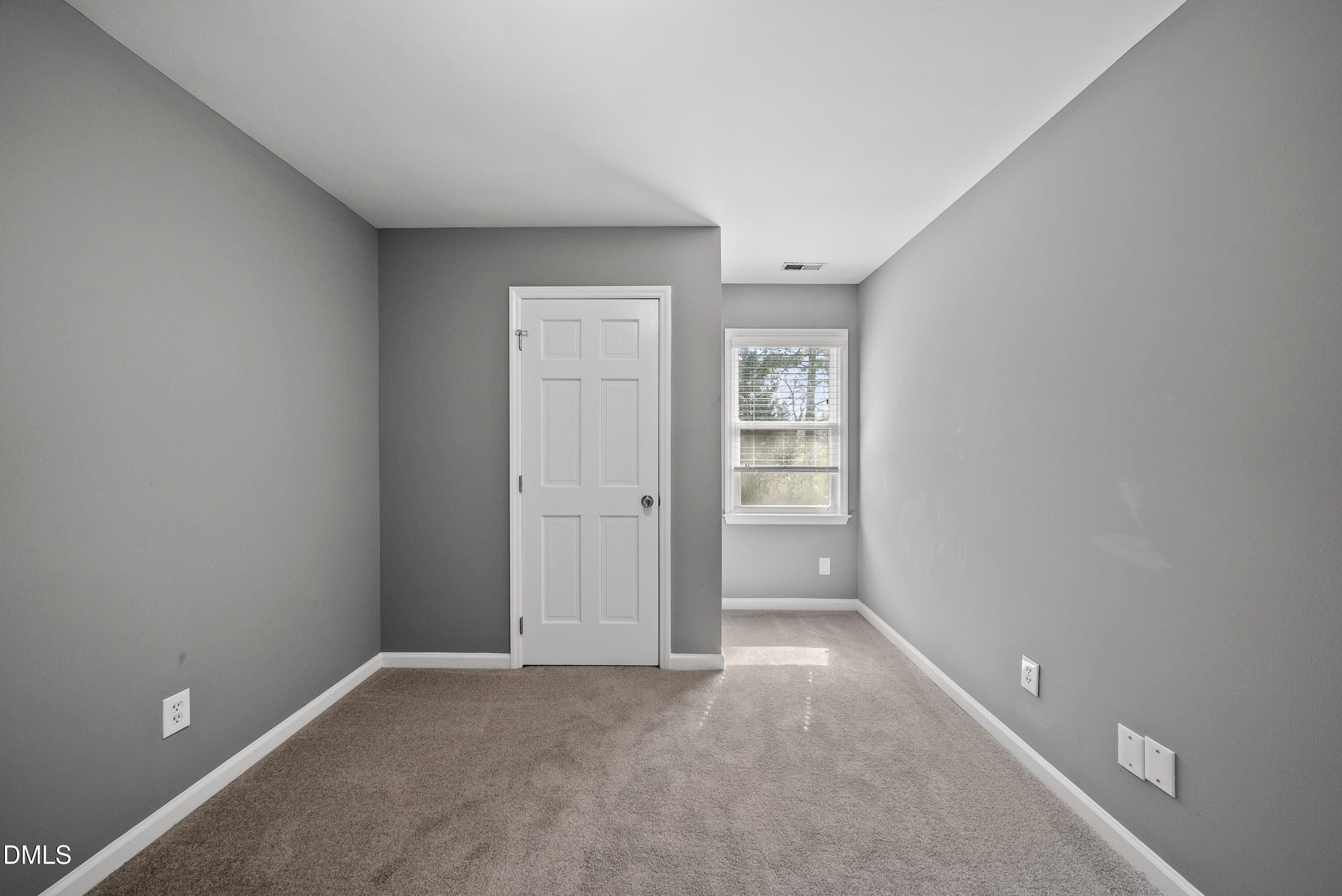 8324 Bellingham Circle Raleigh, NC 27615 - Photo 26 of 34 a view of an empty room with a window