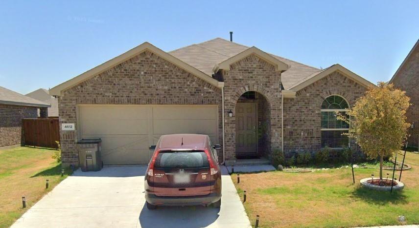 4612 Azurite Road Little Elm, TX 76227 - Photo 1 of 11 a front view of a house with garden