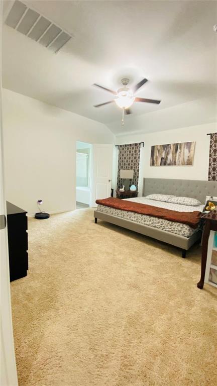 4612 Azurite Road Little Elm, TX 76227 - Photo 5 of 11 a bedroom with a bed and ceiling fan