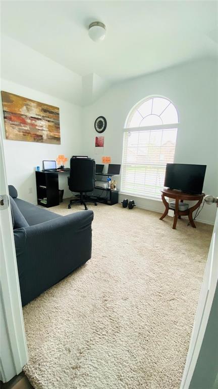 4612 Azurite Road Little Elm, TX 76227 - Photo 6 of 11 a living room with furniture window and a flat screen tv