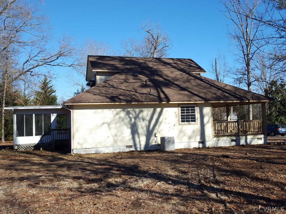 4702 Courthouse Road Chesterfield, VA 23832 - Photo 20 of 22 a side view of a house with a yard