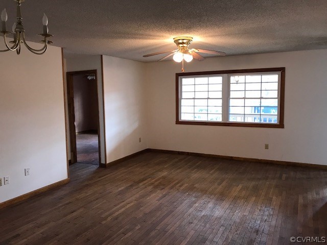 4702 Courthouse Road Chesterfield, VA 23832 - Photo 4 of 22 an empty room with wooden floor chandelier and windows