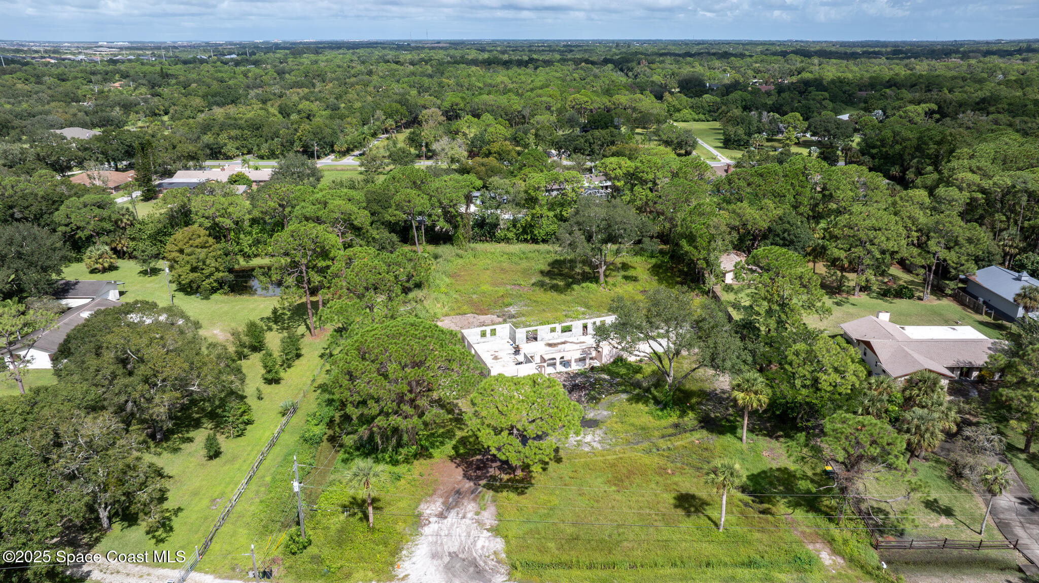 4490 Eldorado Way Melbourne, FL 32934 - Photo 3 of 6 a view of a garden