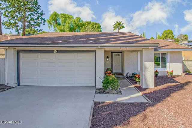 a view of a house with patio