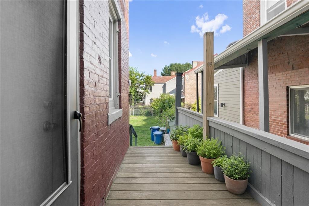 4123 Foster Street Pittsburgh, PA 15201 - Photo 13 of 31 a view of a house with potted plants