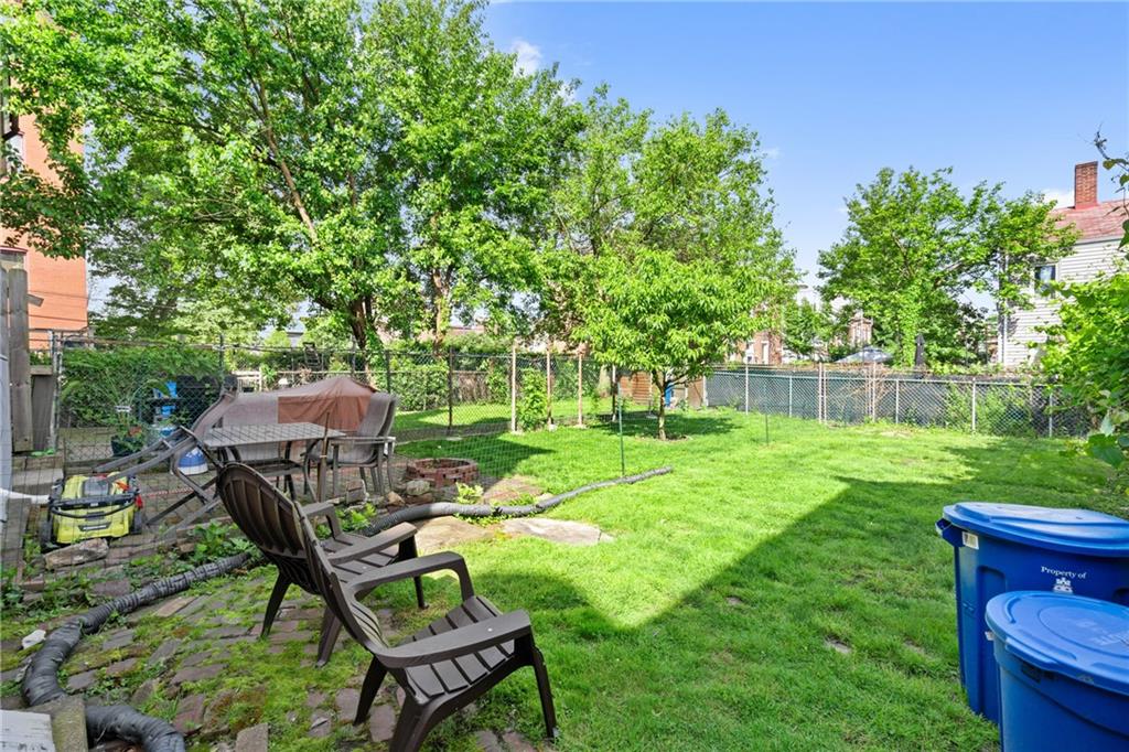 4123 Foster Street Pittsburgh, PA 15201 - Photo 19 of 31 a view of yard with green space and seating