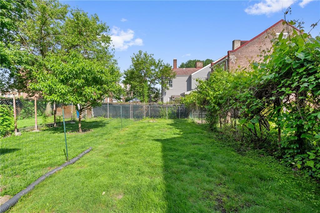 4123 Foster Street Pittsburgh, PA 15201 - Photo 20 of 31 a view of a backyard with a garden