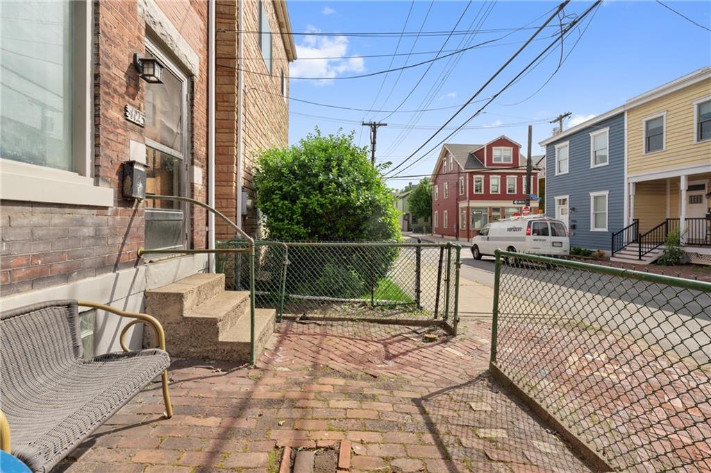 4123 Foster Street Pittsburgh, PA 15201 - Photo 23 of 31 a view of a chairs and table in the balcony