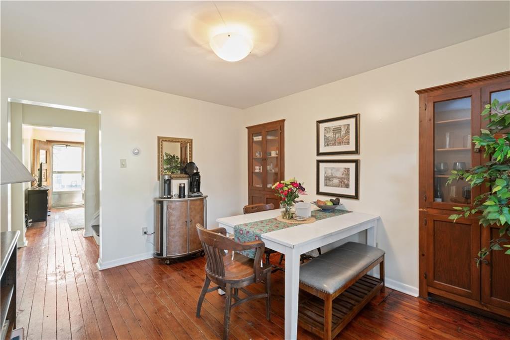 4123 Foster Street Pittsburgh, PA 15201 - Photo 6 of 31 a view of a workspace with furniture and wooden floor