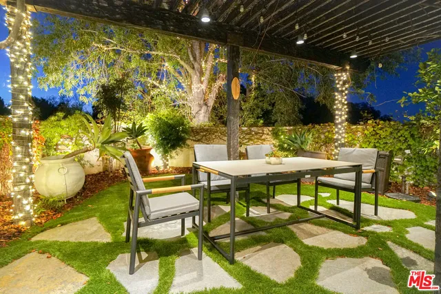 a view of a chairs and tables in the patio