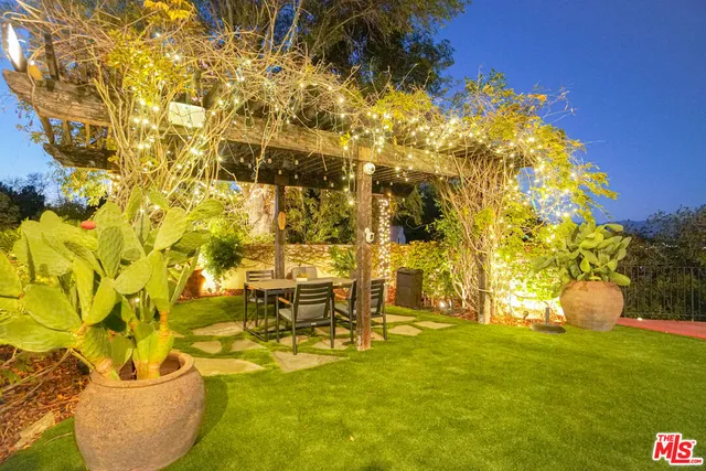 a building with swimming pool in front of it