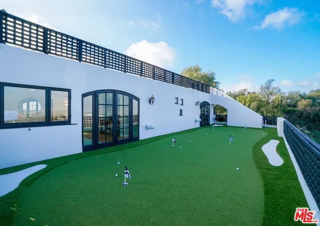 a view of a terrace with a garden