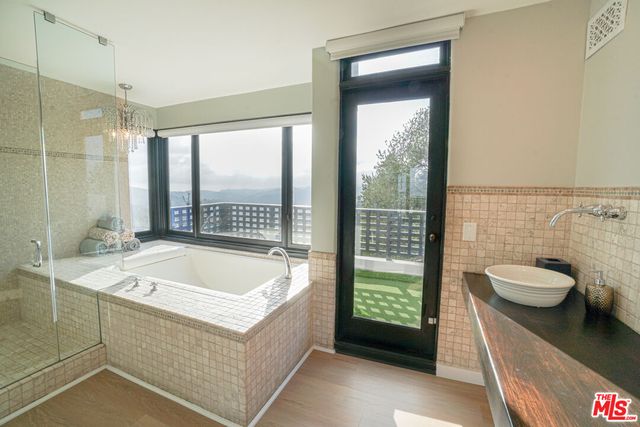 a view of a swimming pool with a balcony