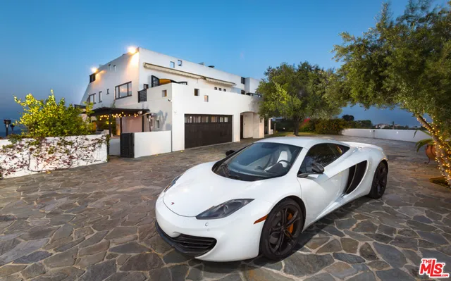 a room with furniture and a flat screen tv