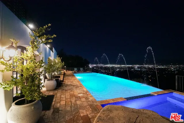 a view of a balcony with dining area