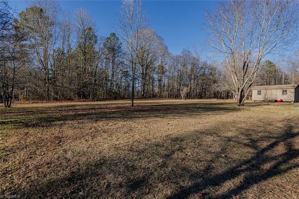 5139 Adder Ridge Lane Burlington, NC 27217 - Photo 13 of 16 Front Yard & Storage Building