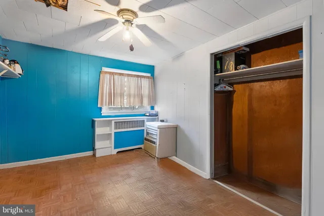 a room with bed and a window