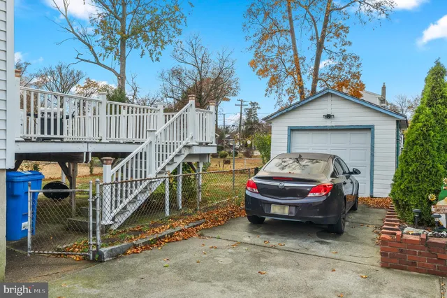 a car parked in front of a house