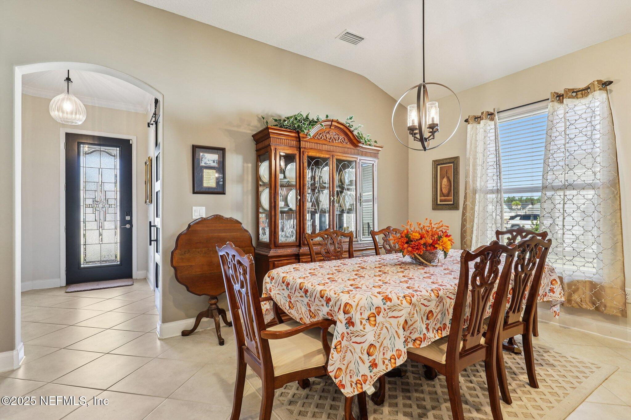 48 Fawn Field Lane St. Augustine, FL 32092 - Photo 13 of 73 a view of a dining room with furniture window and outside view