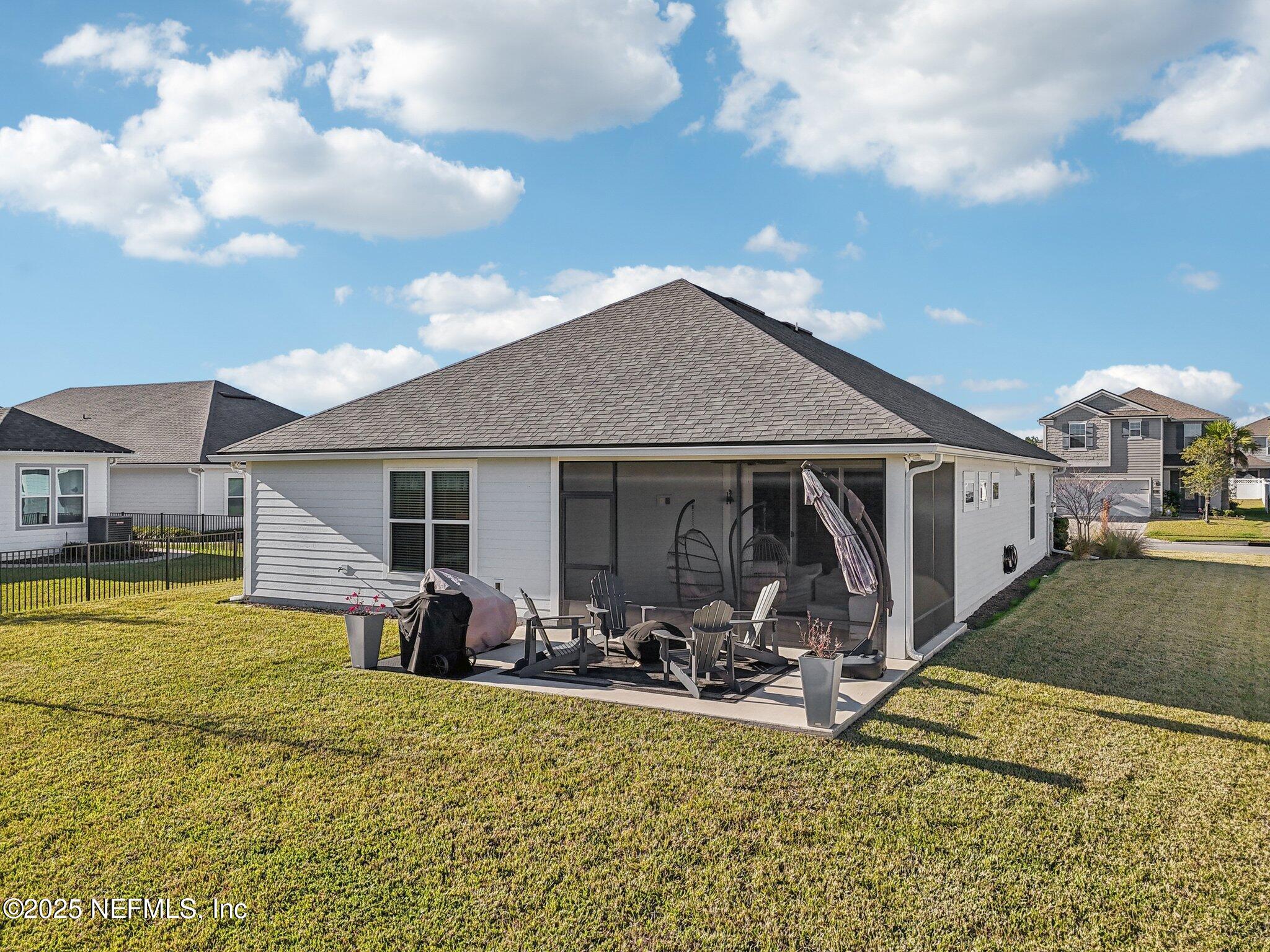 48 Fawn Field Lane St. Augustine, FL 32092 - Photo 46 of 73 a view of a house with swimming pool and sitting area