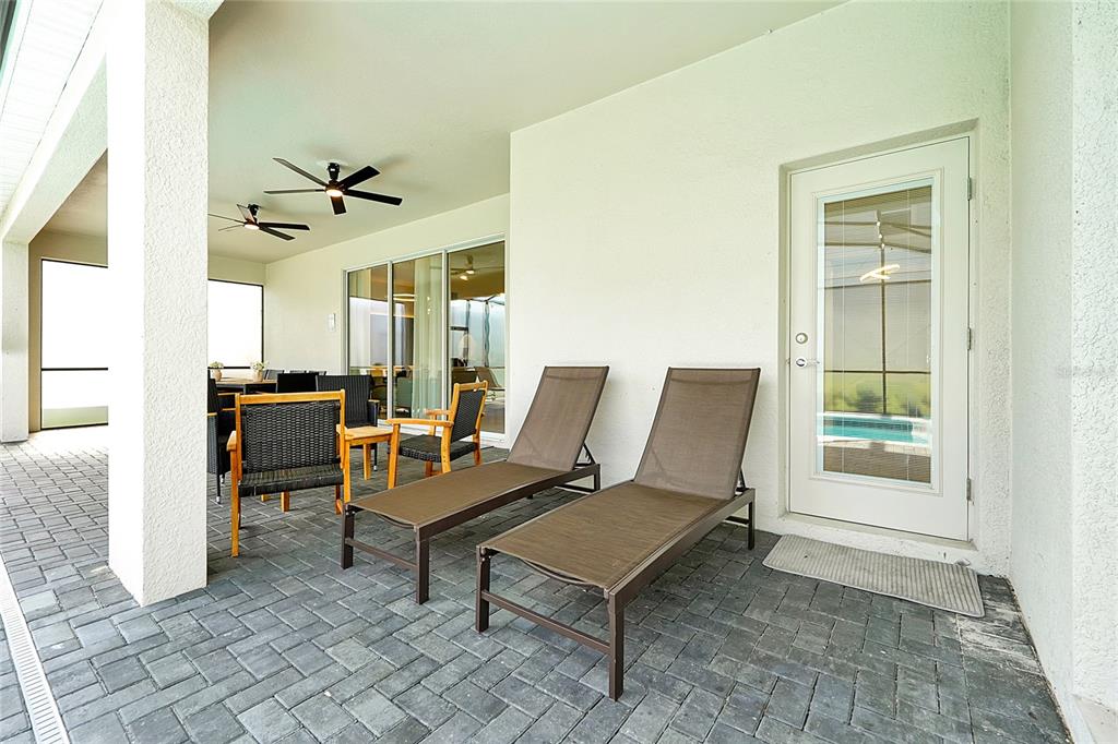 4494 Kaipo Road Davenport, FL 33897 - Photo 23 of 100 a living room with furniture and a window