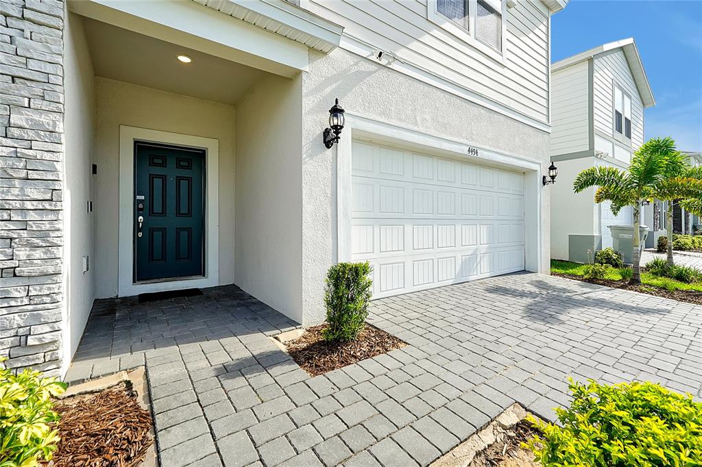 4494 Kaipo Road Davenport, FL 33897 - Photo 3 of 100 a view of a entryway door front of house