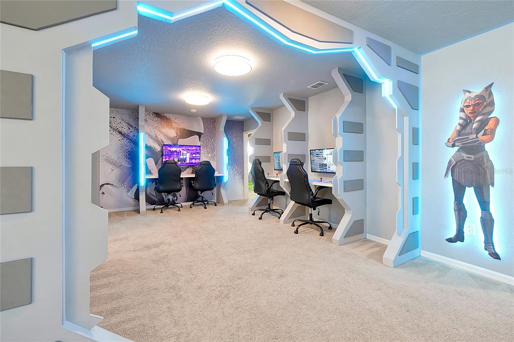 4494 Kaipo Road Davenport, FL 33897 - Photo 55 of 100 a view of a room with gym equipment