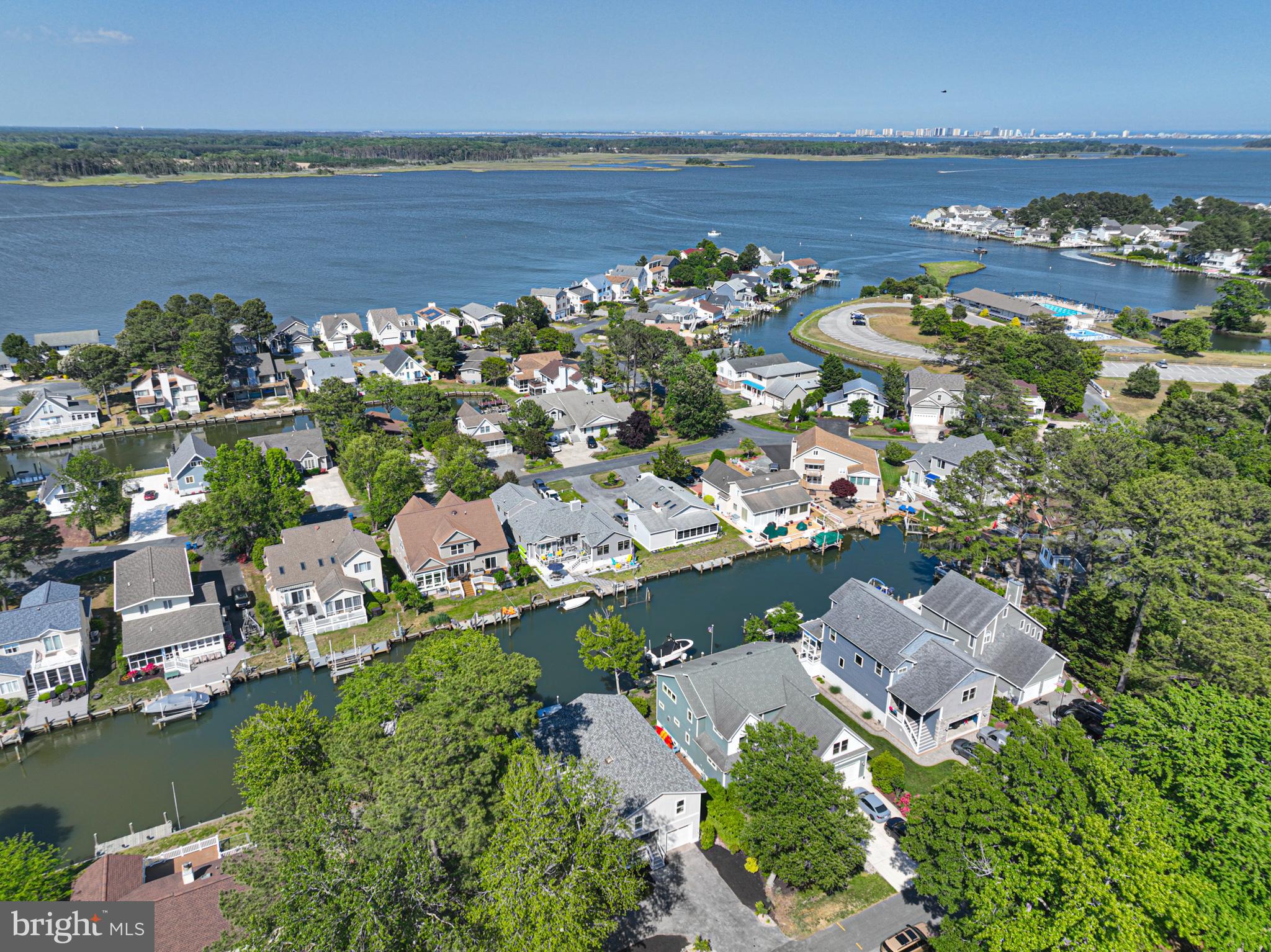 8 Grand Port Road Ocean Pines, MD 21811 - Photo 11 of 18 an aerial view of a city with lots of residential buildings ocean and mountain view in back