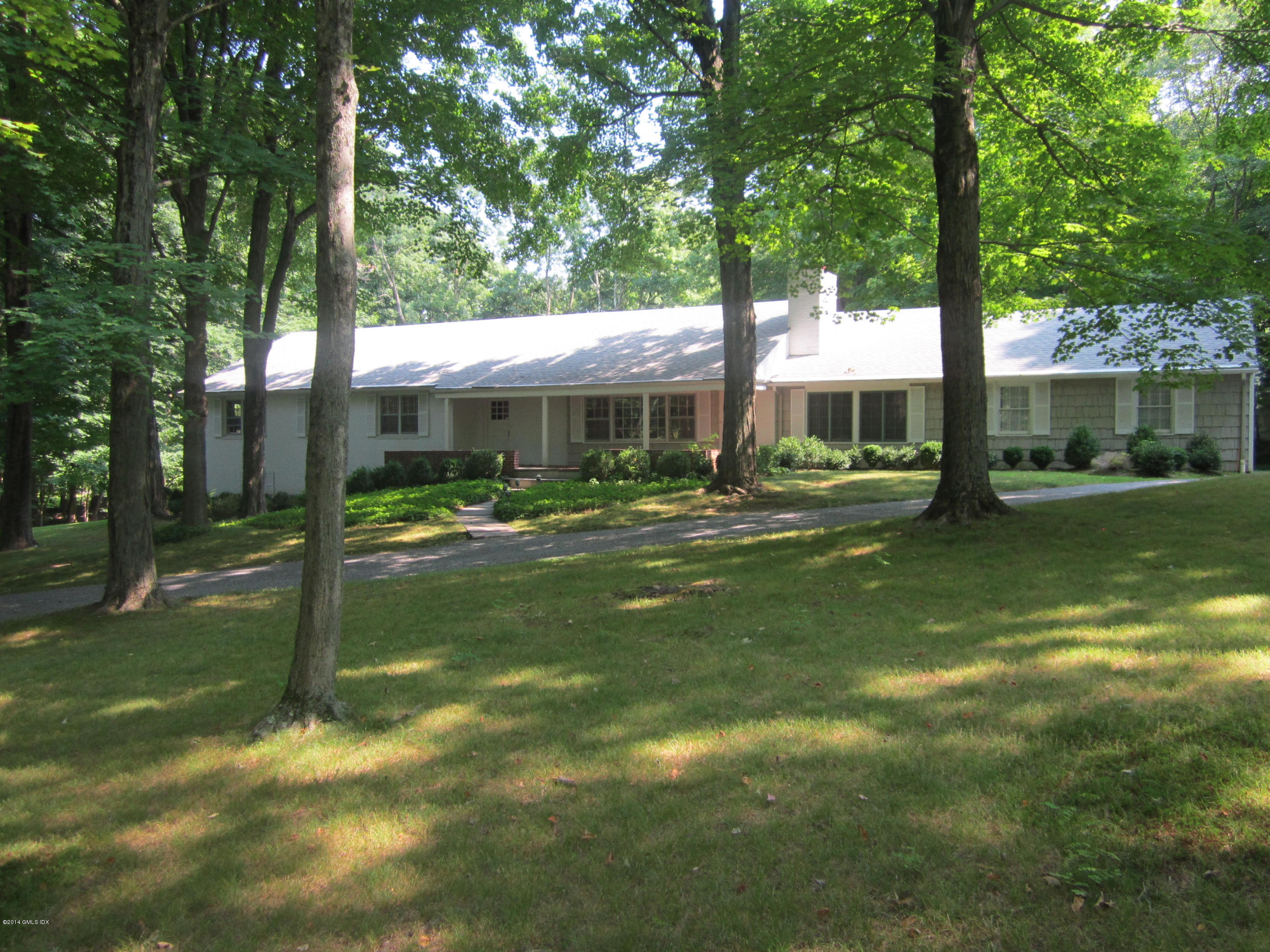 208 Taconic Road Greenwich, CT 06831 - Photo 1 of 1 a view of a patio with a big yard