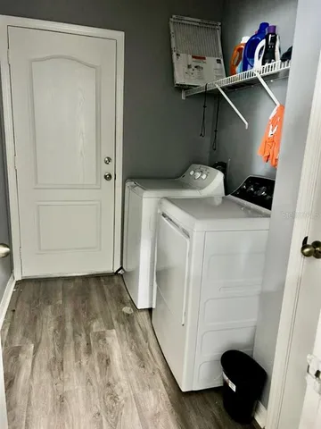 a utility room with dryer and washer