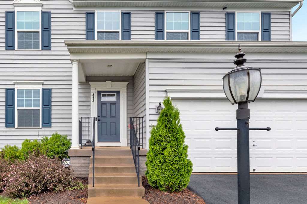 252 Ridgemont Road Ruckersville, VA 22968 - Photo 3 of 48 a front view of a house with potted plants
