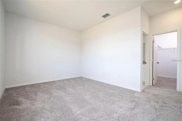 an empty room with an entryway