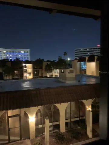 a kitchen with a table and chairs in it