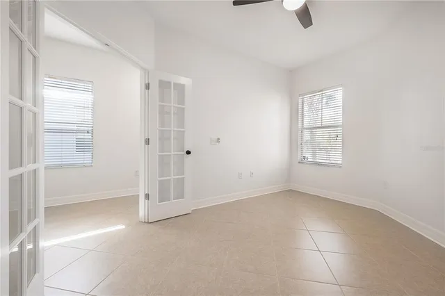 an empty room with windows